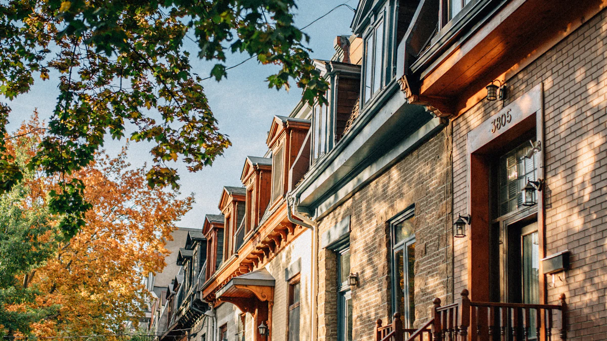 Colourful row houses on a tree-lined street in Montreal in autumn